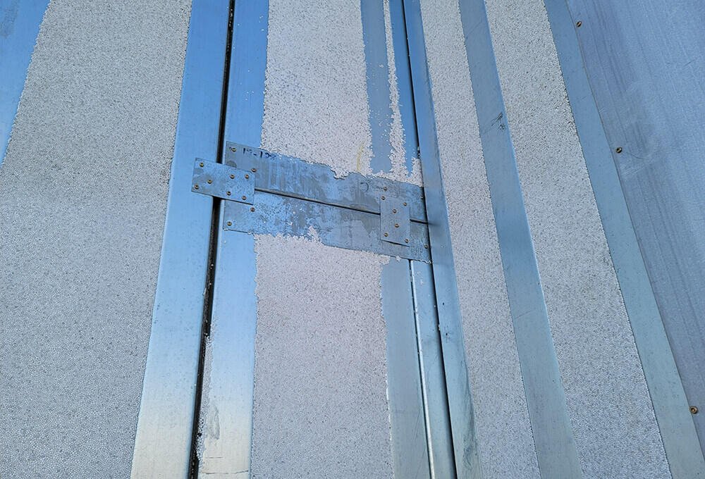 Close-up of a ThermaSteel panel — light gauge steel studs bonded to EPS